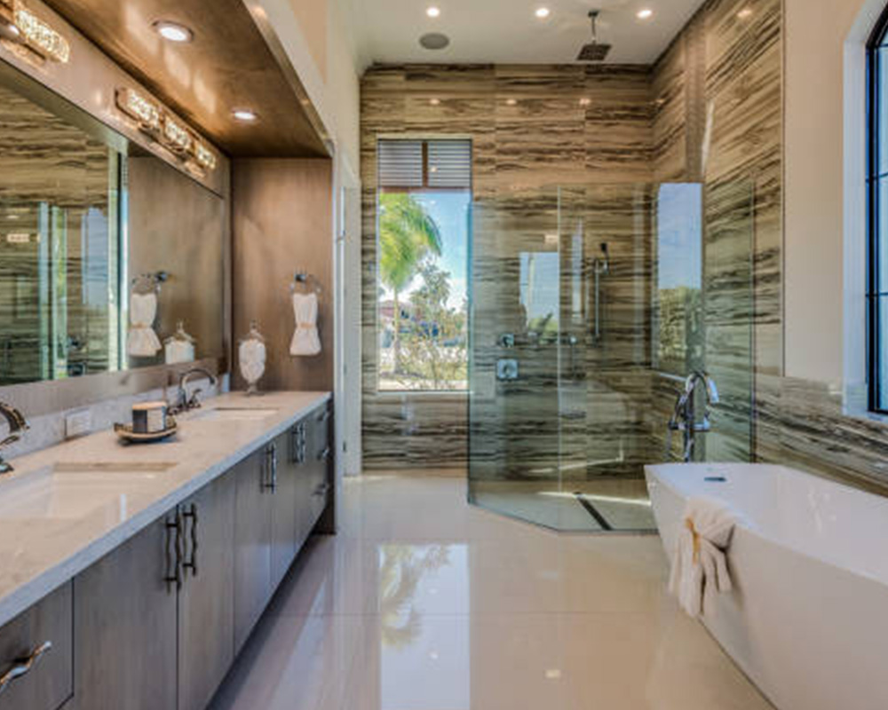 luxury bathroom interiors with marble countertops and bathtub installed naples fl