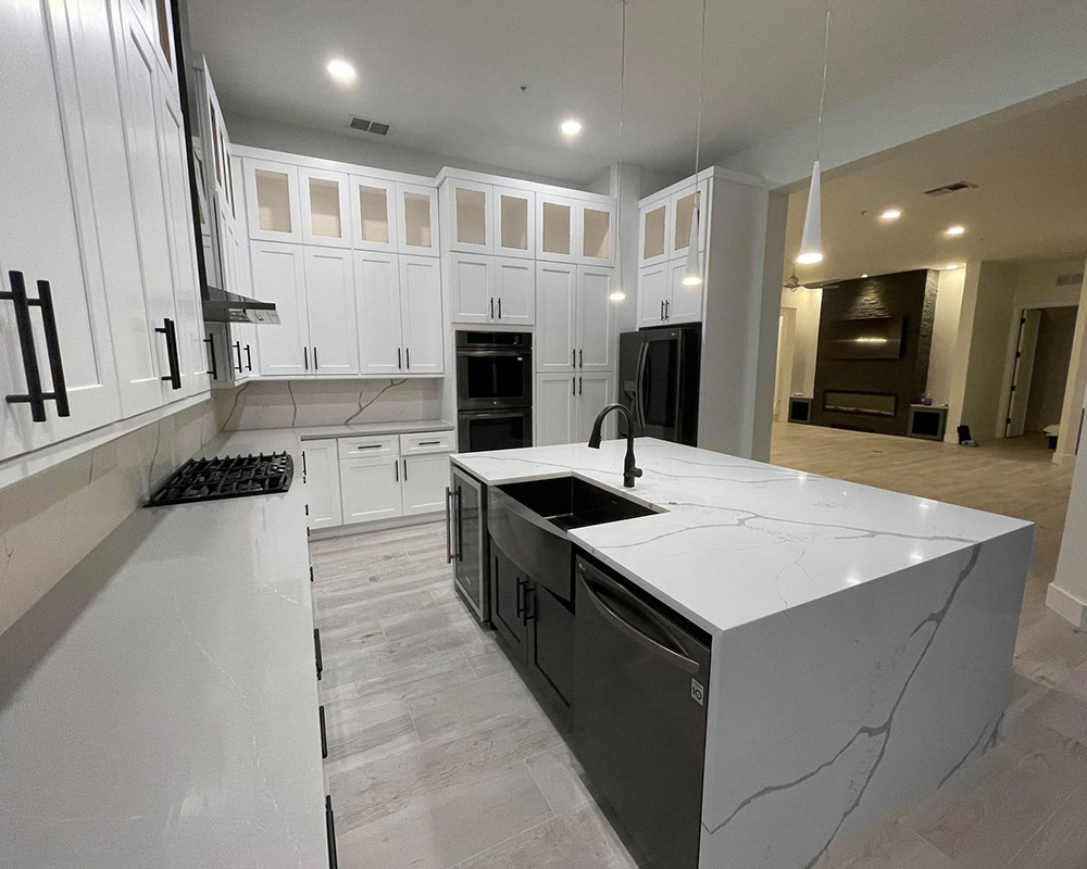 luxury house kitchen interiors remodeled with white cabinets and marble countertops naples fl